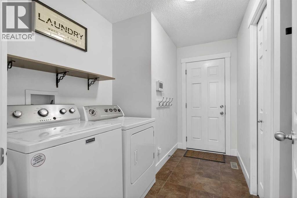 811 Boulder Creek Drive SE, Langdon, Alberta  T0J 1X3 - Photo 19 - A2277003