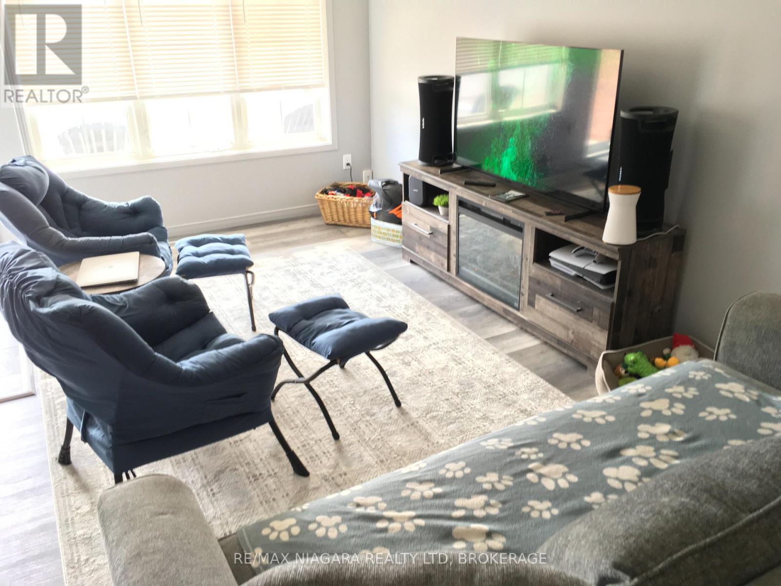 7701 Cortina Crescent, Niagara Falls (Ascot), Ontario  L2H 3B4 - Photo 5 - X12940370