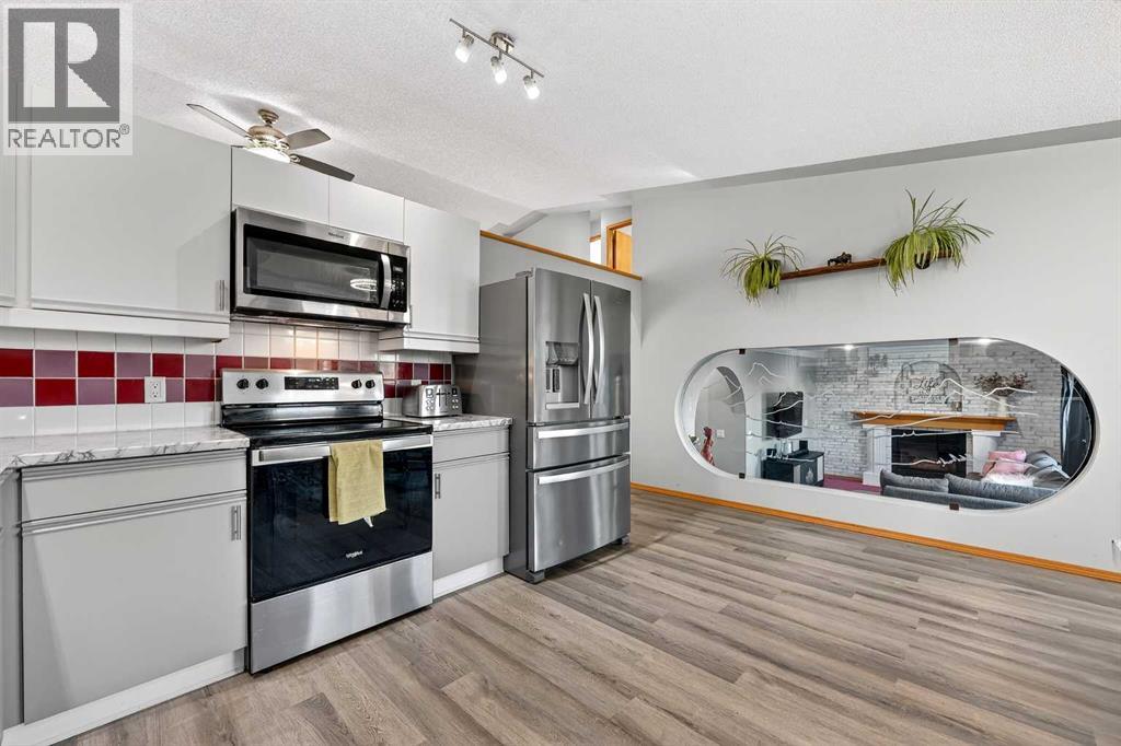 1336 Meadowbrook Drive SE, Airdrie, Alberta  T4A 2B3 - Photo 11 - A2279536