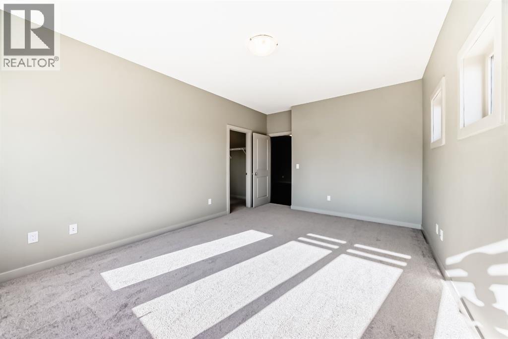 12 Cougar Ridge Landing SW, Calgary, Alberta  T3H 0X8 - Photo 28 - A2277045