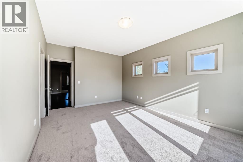 12 Cougar Ridge Landing SW, Calgary, Alberta  T3H 0X8 - Photo 29 - A2277045