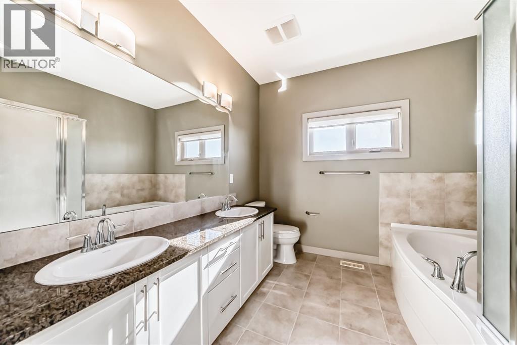 12 Cougar Ridge Landing SW, Calgary, Alberta  T3H 0X8 - Photo 30 - A2277045