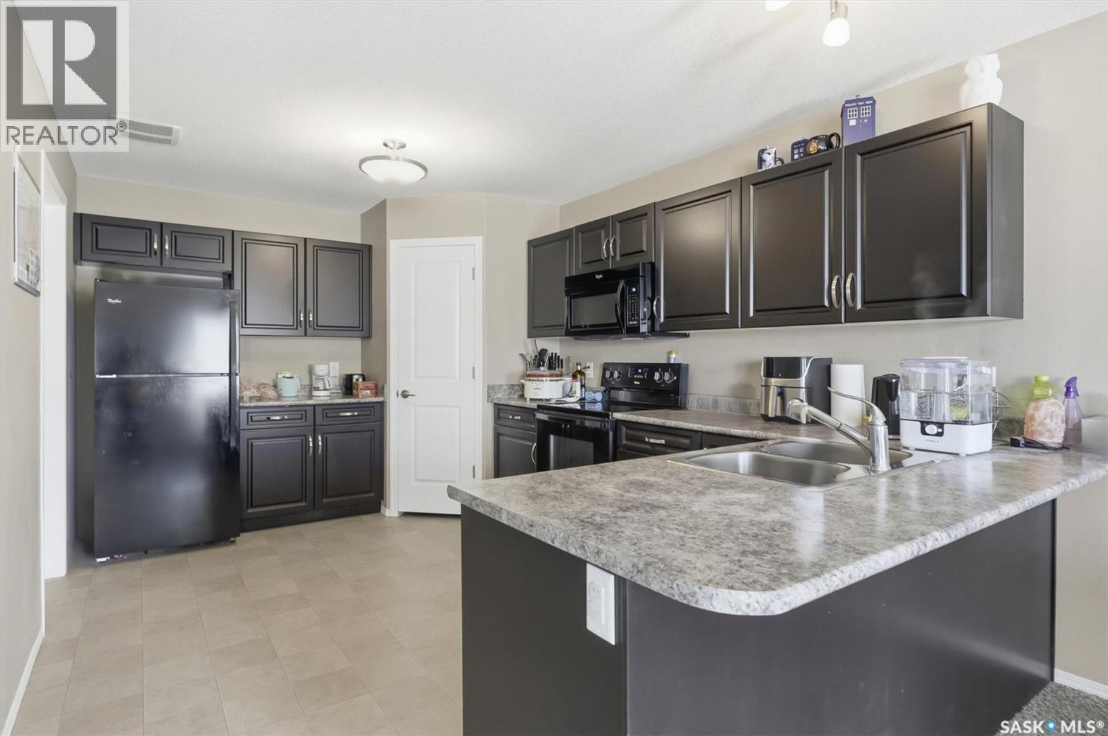 222 100 Chaparral Boulevard, Martensville, Saskatchewan  S0K 0A2 - Photo 9 - SK031674