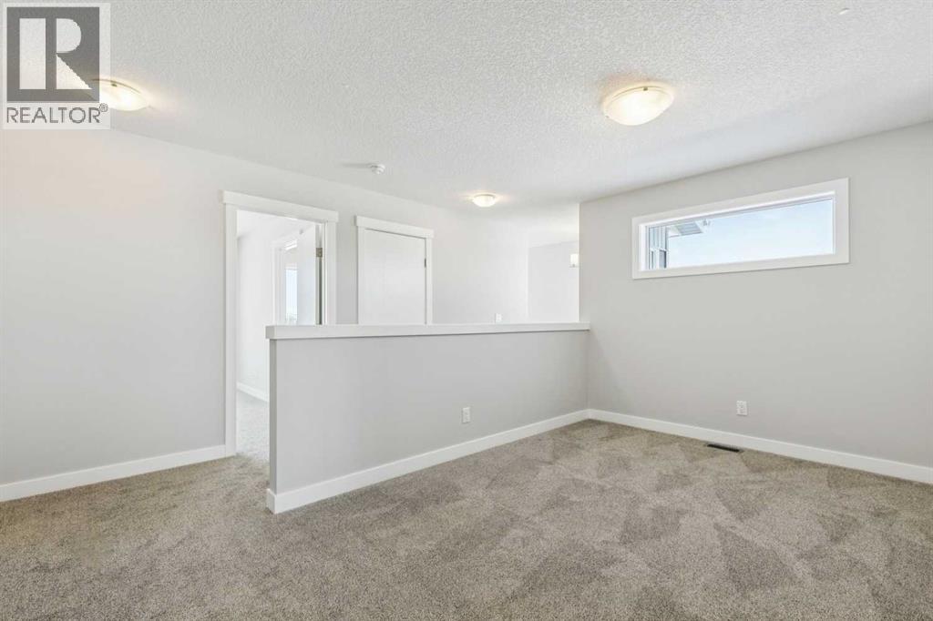 12 Willow Park Point, Cochrane, Alberta  T4C 2V3 - Photo 18 - A2287950