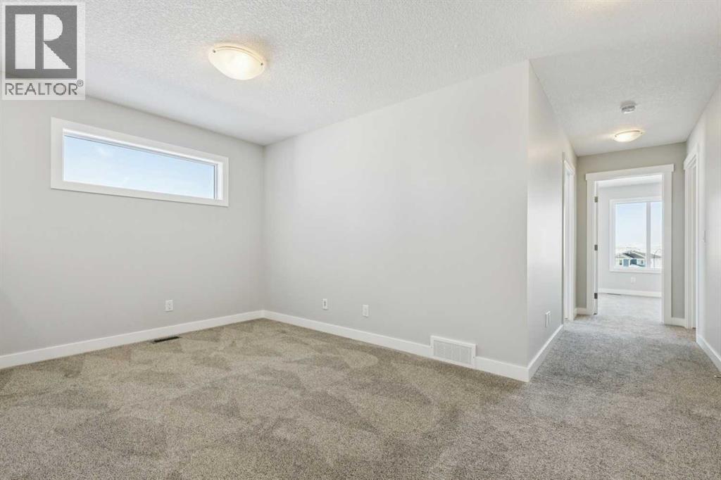 12 Willow Park Point, Cochrane, Alberta  T4C 2V3 - Photo 24 - A2287950