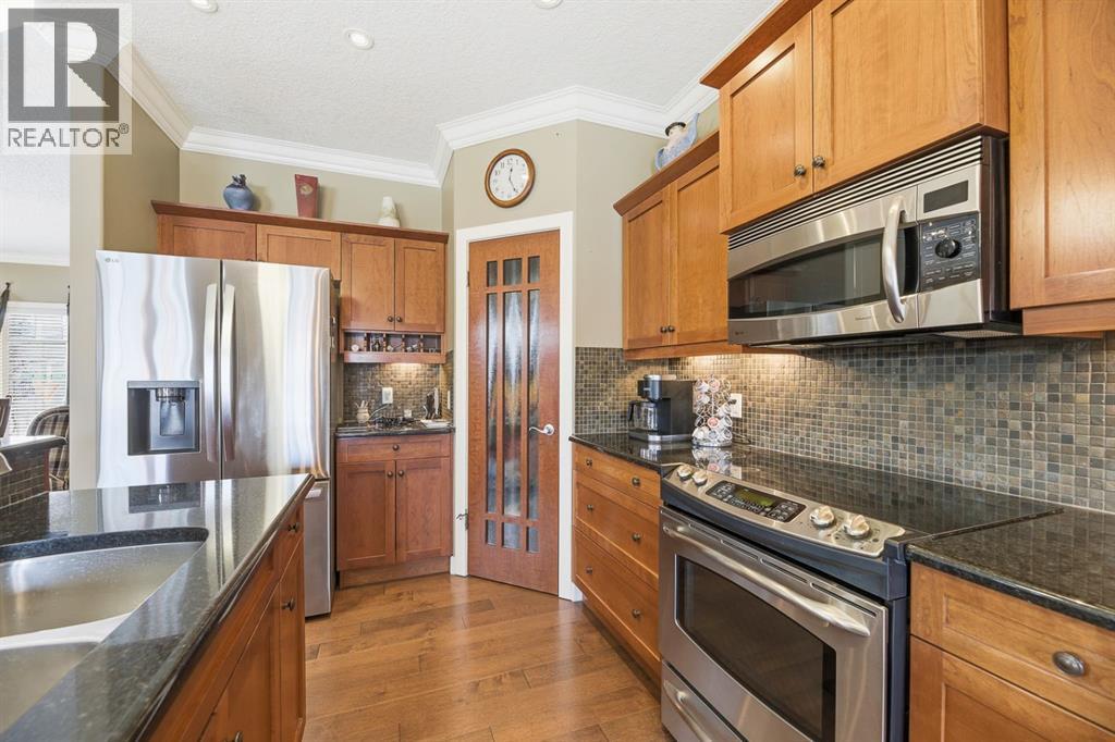 4 Bridle Estates Road SW, Calgary, Alberta  T2Y 5A8 - Photo 15 - A2287371