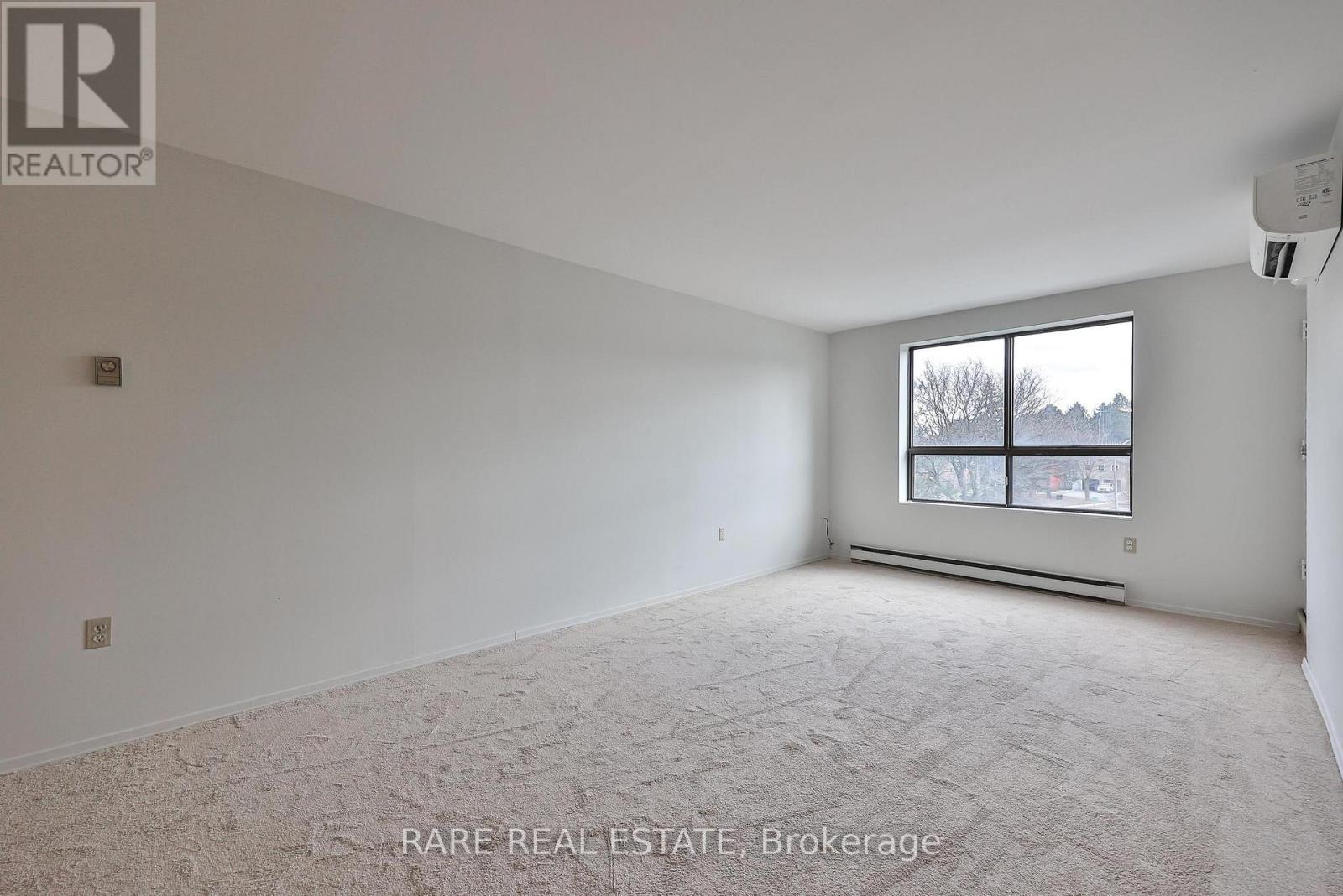 305 - 45 Bredin Parkway, Orangeville, Ontario  L9W 3X2 - Photo 3 - W12941390