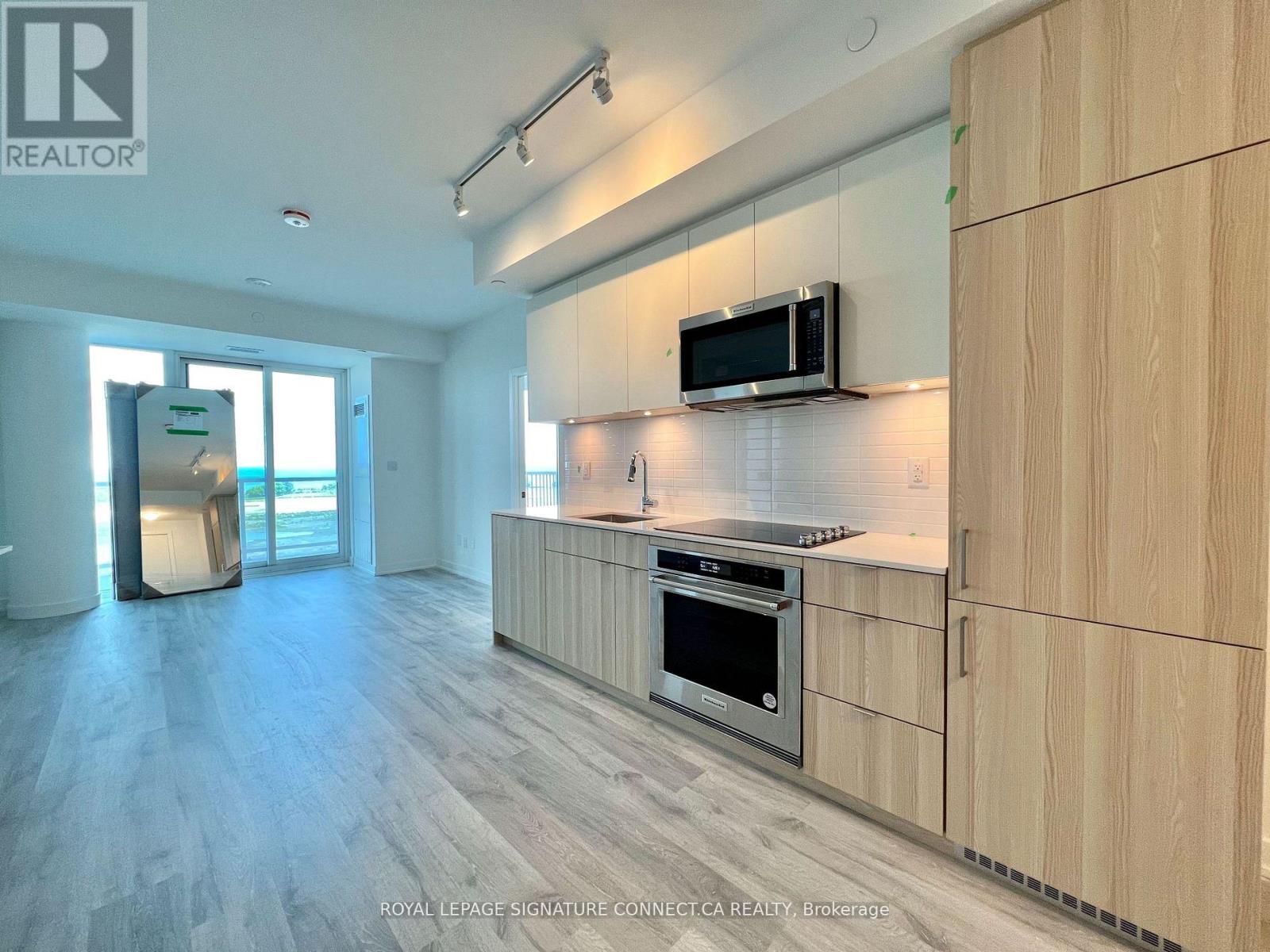 706 - 220 Missinnihe Way, Mississauga, Ontario  L5H 0A9 - Photo 3 - W12941434