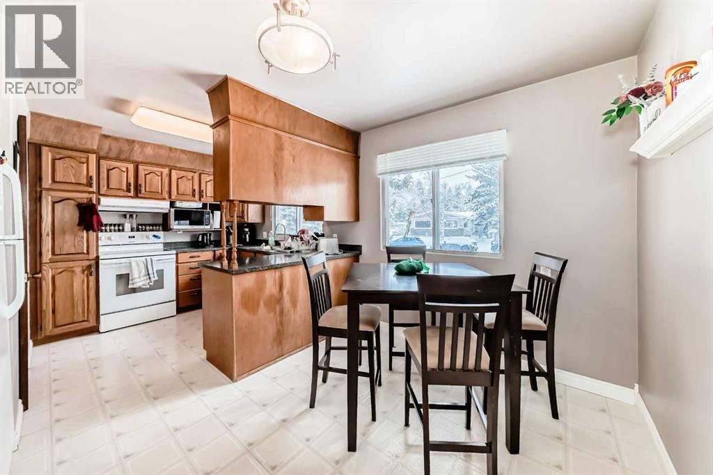 1228 Rosehill Drive NW, Calgary, Alberta  T2K 1M1 - Photo 6 - A2293038