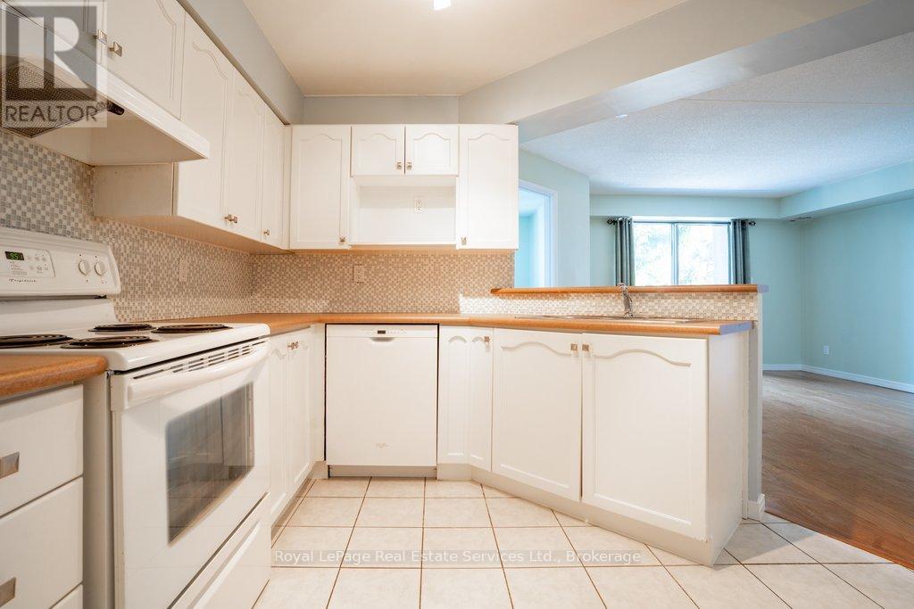 214 - 3499 Upper Middle Road, Burlington, Ontario  L7M 4M7 - Photo 2 - W12760850