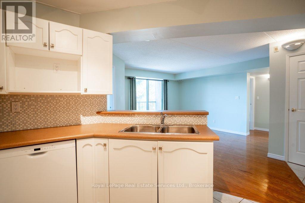 214 - 3499 Upper Middle Road, Burlington, Ontario  L7M 4M7 - Photo 3 - W12760850