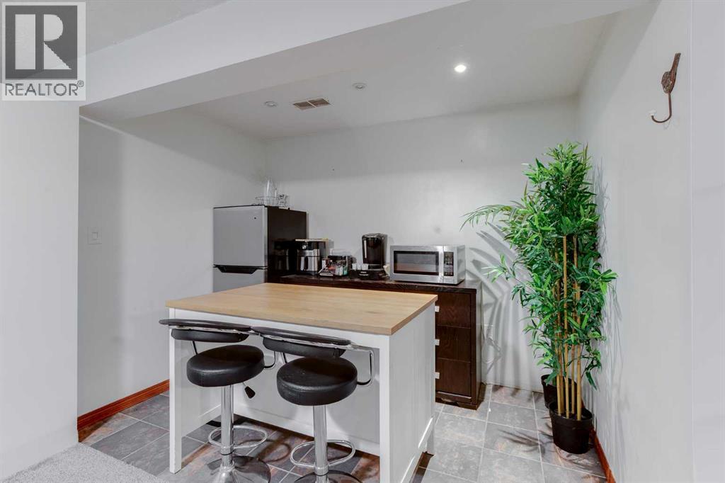 1409 Kings Heights Boulevard SE, Airdrie, Alberta  T4A 0A1 - Photo 34 - A2275325