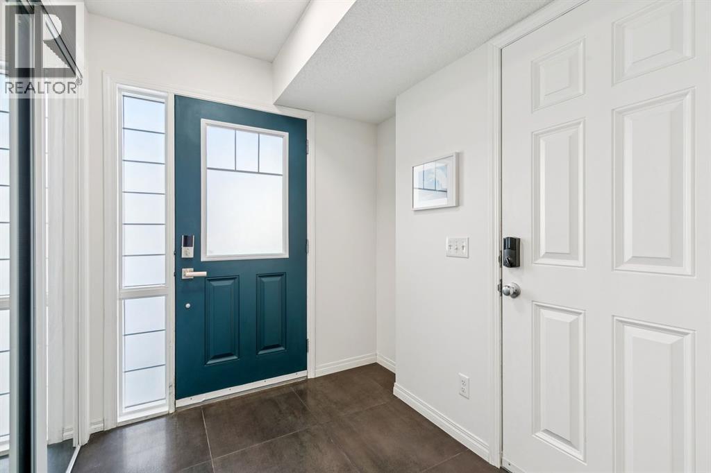 321 Windstone Gardens SW, Airdrie, Alberta  T4B 3R5 - Photo 4 - A2290560