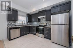 63 Gateland Drive, Barrie, Ontario  L4N 6K4 - Photo 5 - S12936382