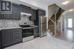 63 Gateland Drive, Barrie, Ontario  L4N 6K4 - Photo 6 - S12936382