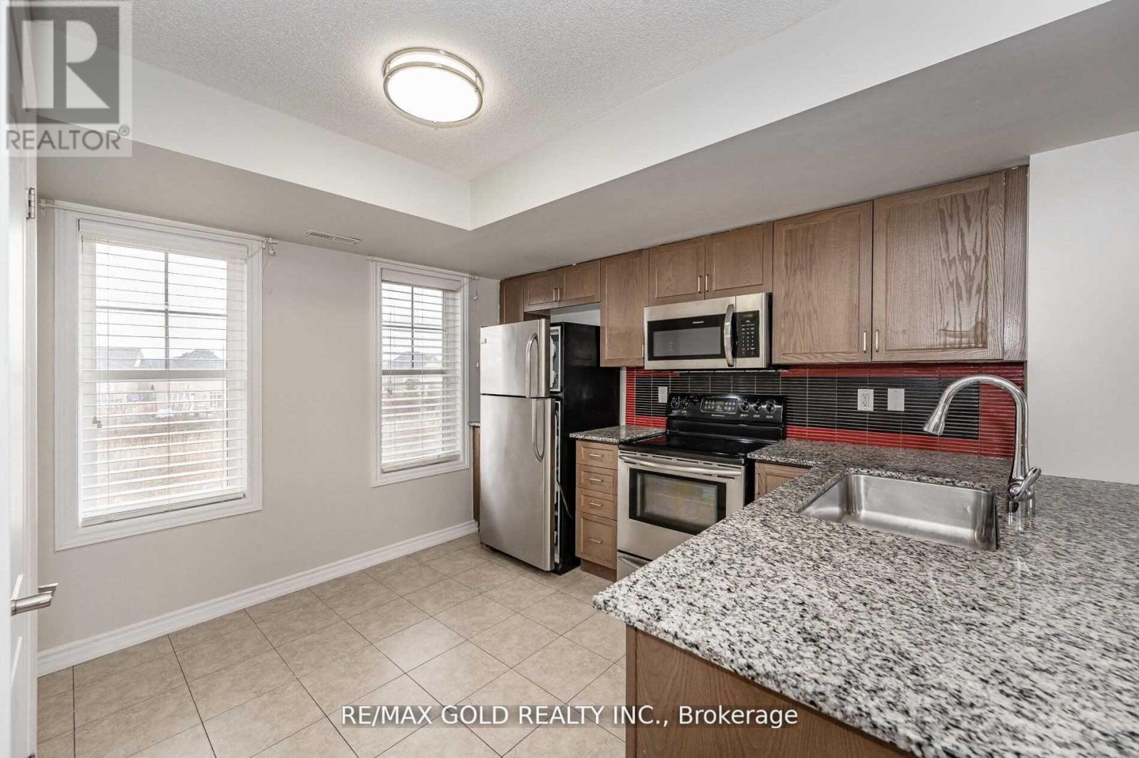 #125 - 1380 Costigan Road, Milton, Ontario  L9T 8L2 - Photo 6 - W12941724