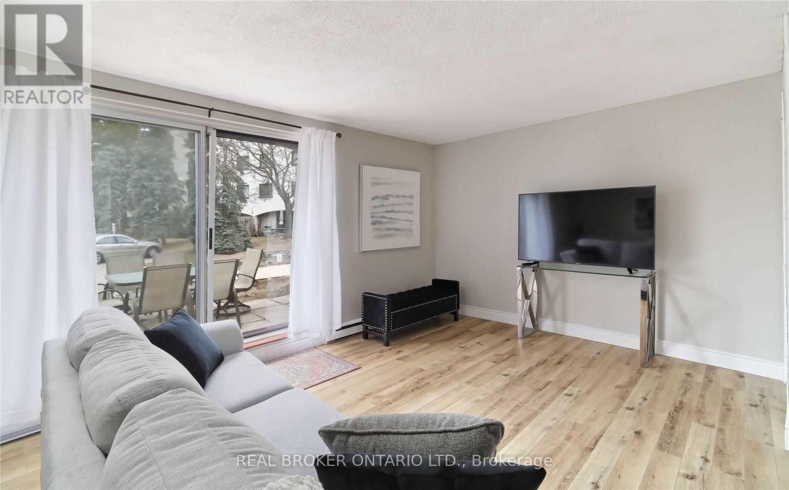 41 - 1016 Falgarwood Drive, Oakville, Ontario  L6H 2P5 - Photo 3 - W12941738