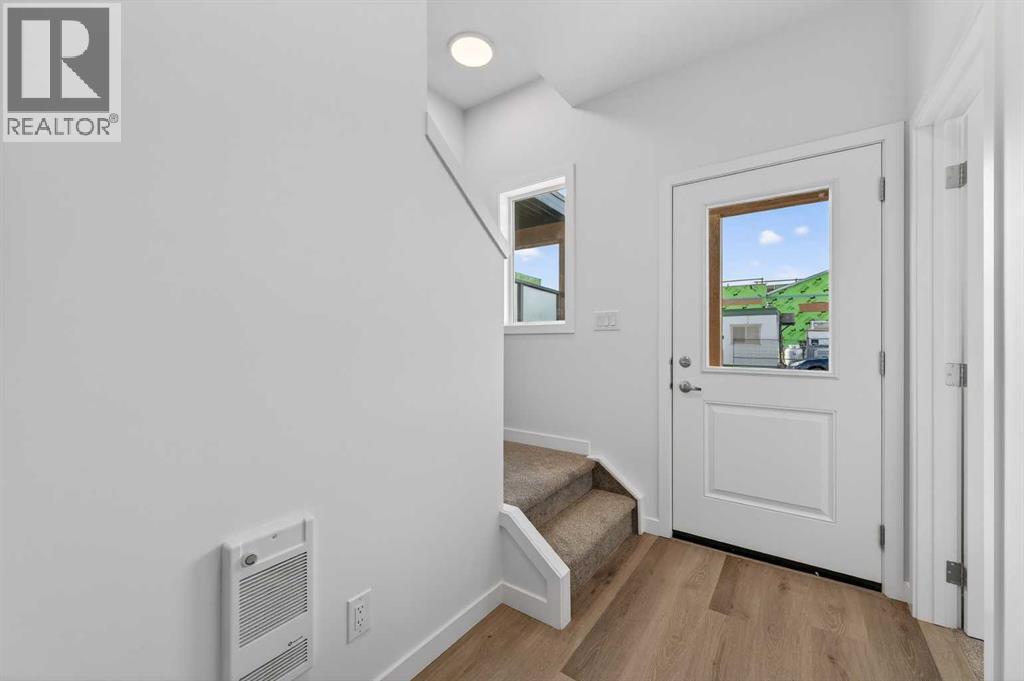 32 Red Embers Plaza NE, Calgary, Alberta  T3N 2W1 - Photo 3 - A2295986