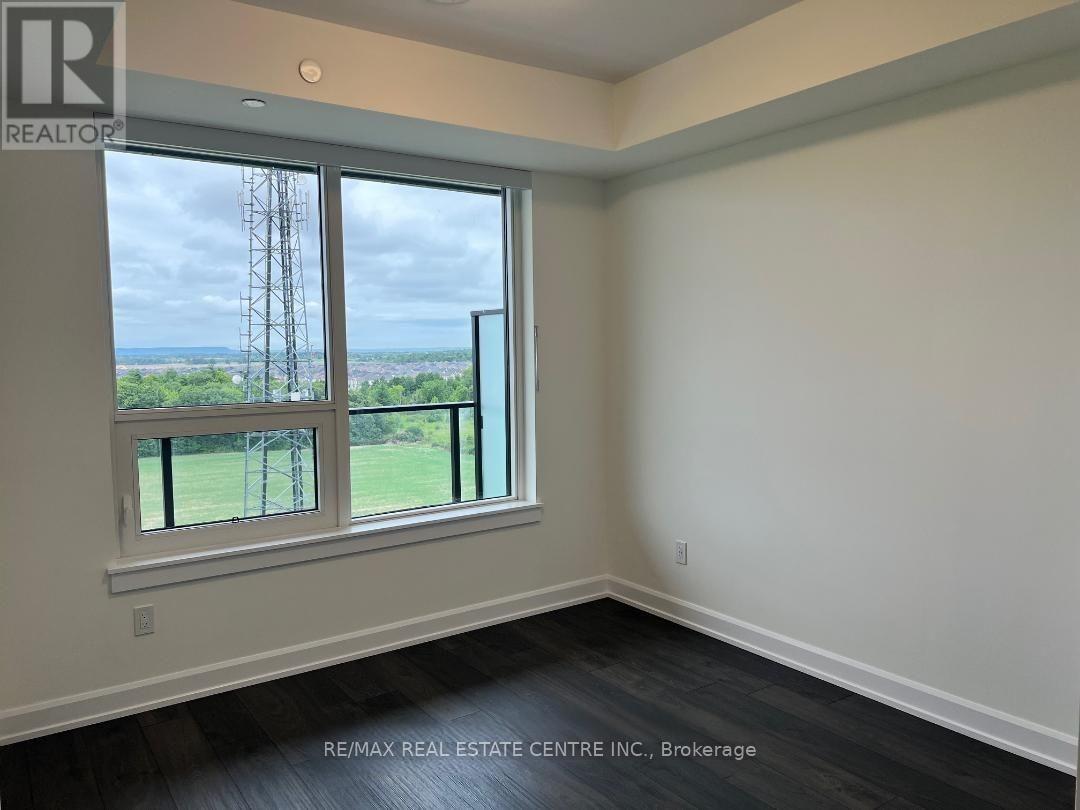 1007 - 3220 William Coltson Avenue, Oakville, Ontario  L6H 7X9 - Photo 8 - W12941814