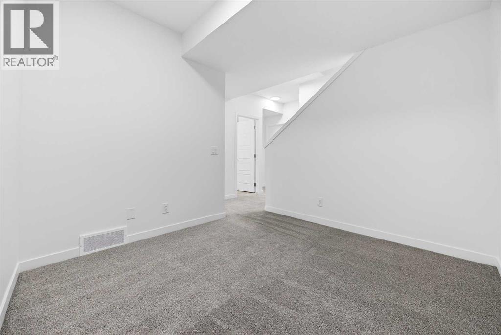 66 Creekside Way SW, Calgary, Alberta  T2X 6E2 - Photo 33 - A2292722