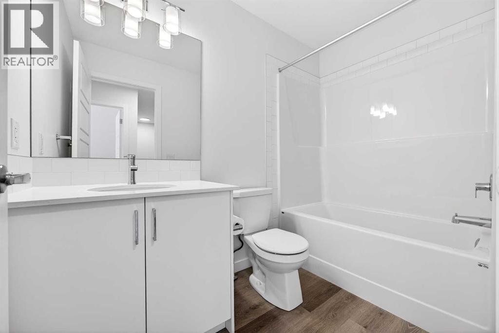 66 Creekside Way SW, Calgary, Alberta  T2X 6E2 - Photo 26 - A2292722