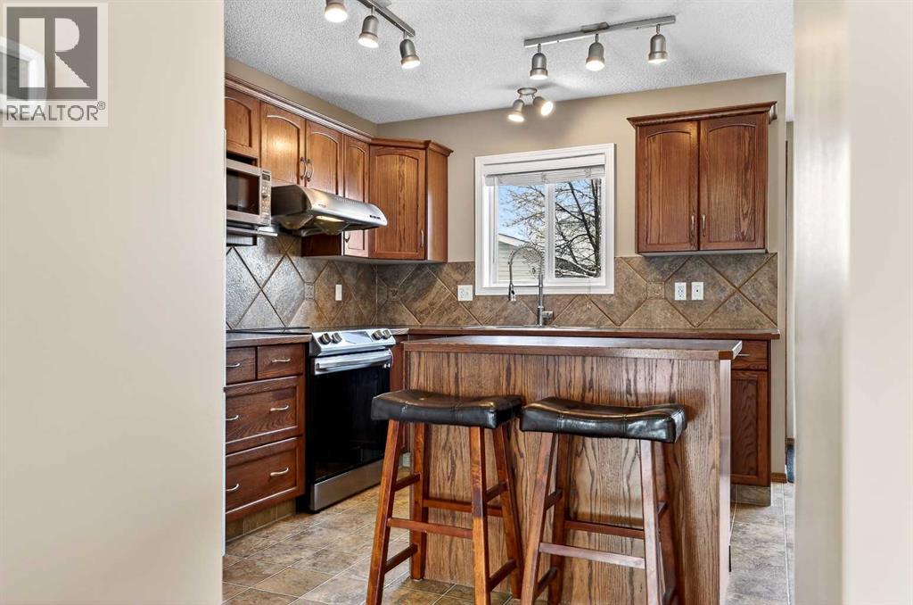 57 Everridge Way Sw, Calgary, Alberta  T2Y 4S7 - Photo 15 - A2296795