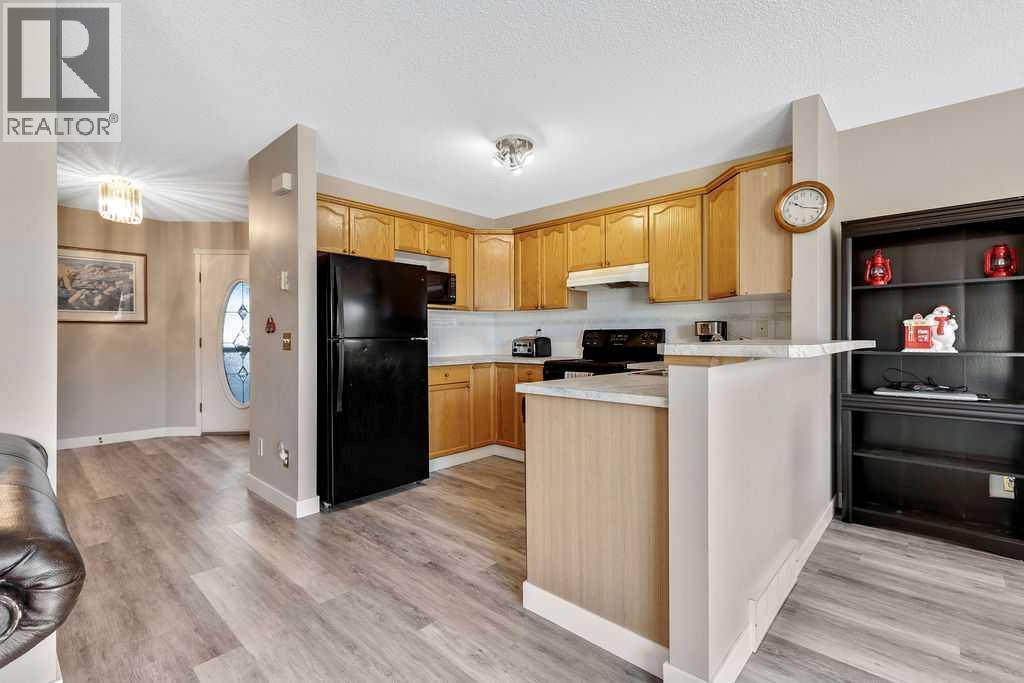 166 Harvest Rose Circle Ne, Calgary, Alberta  T3K 4M7 - Photo 7 - A2269222