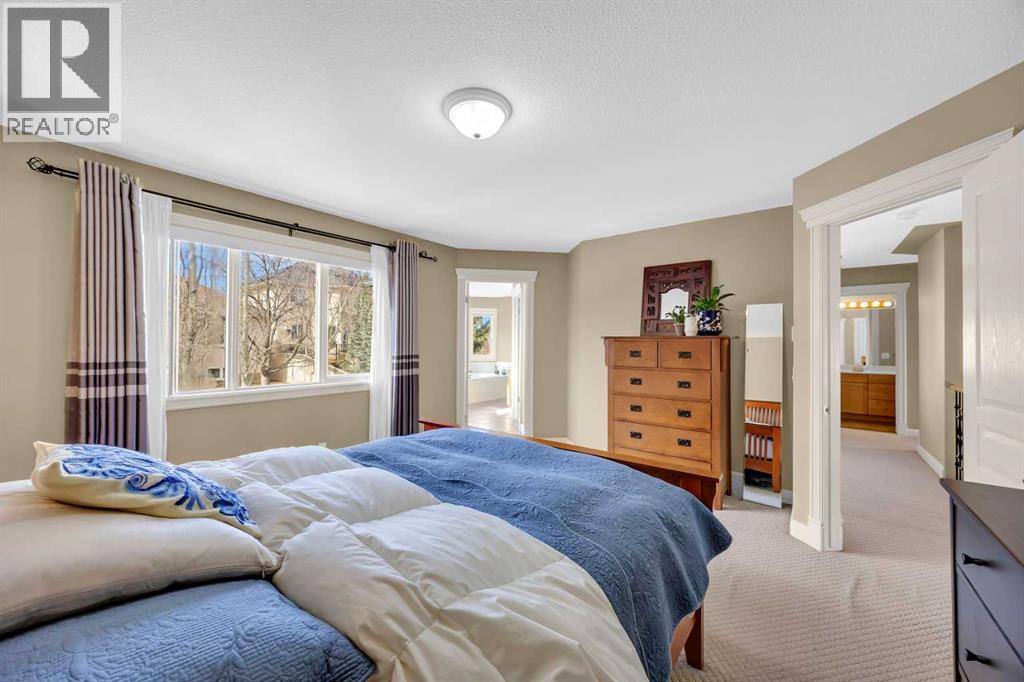 97 Strathridge Close SW, Calgary, Alberta  T3H 4J3 - Photo 25 - A2294102