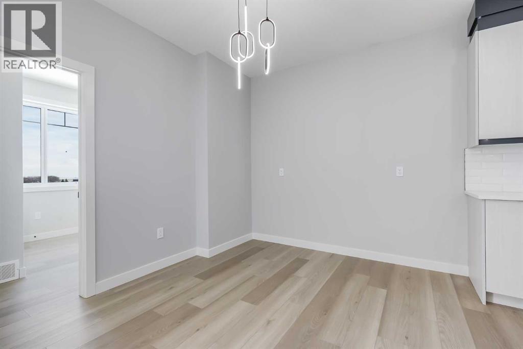 1955 Mccaskill Drive, Crossfield, Alberta  T0M 0S0 - Photo 12 - A2297169