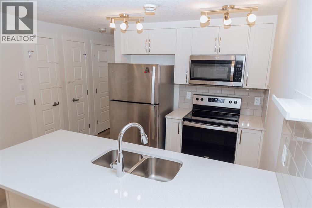 405, 474 Seton Circle, Calgary, Alberta  T3M 2V3 - Photo 4 - A2279098