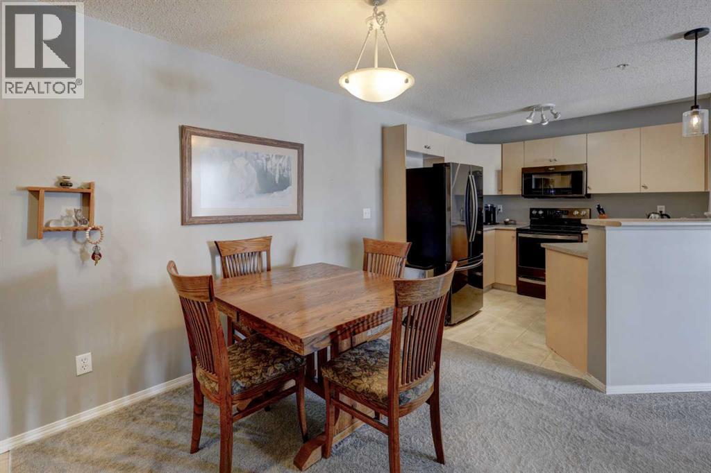 7303, 304 Mackenzie Way Sw, Airdrie, Alberta T4B 3H7 - Photo 5 - A2296988