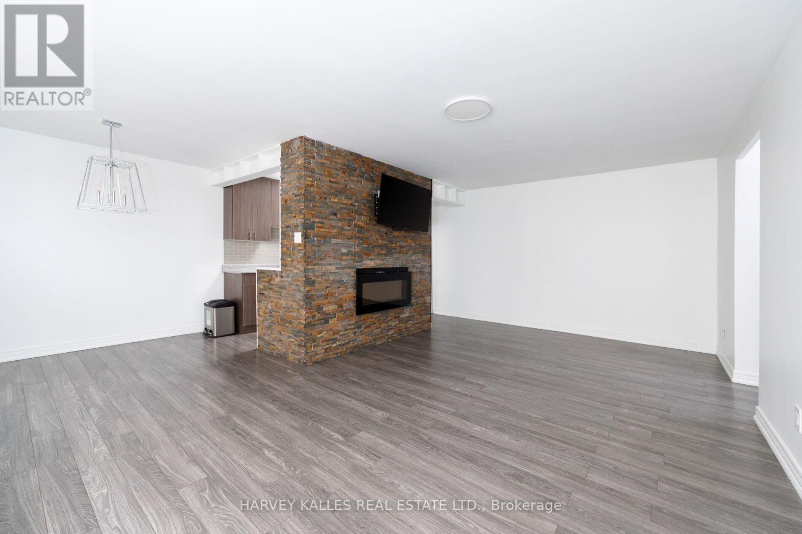 304 - 50 Gulliver Road, Toronto, Ontario  M6M 2N2 - Photo 15 - W12942108
