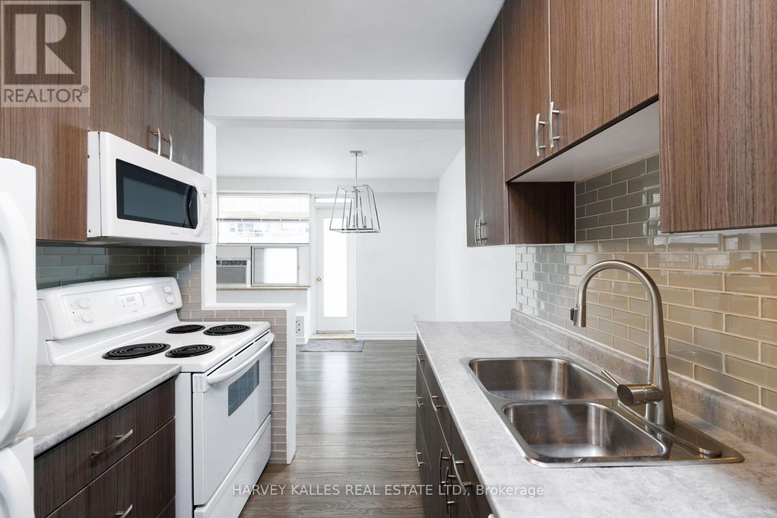 304 - 50 Gulliver Road, Toronto, Ontario  M6M 2N2 - Photo 17 - W12942108