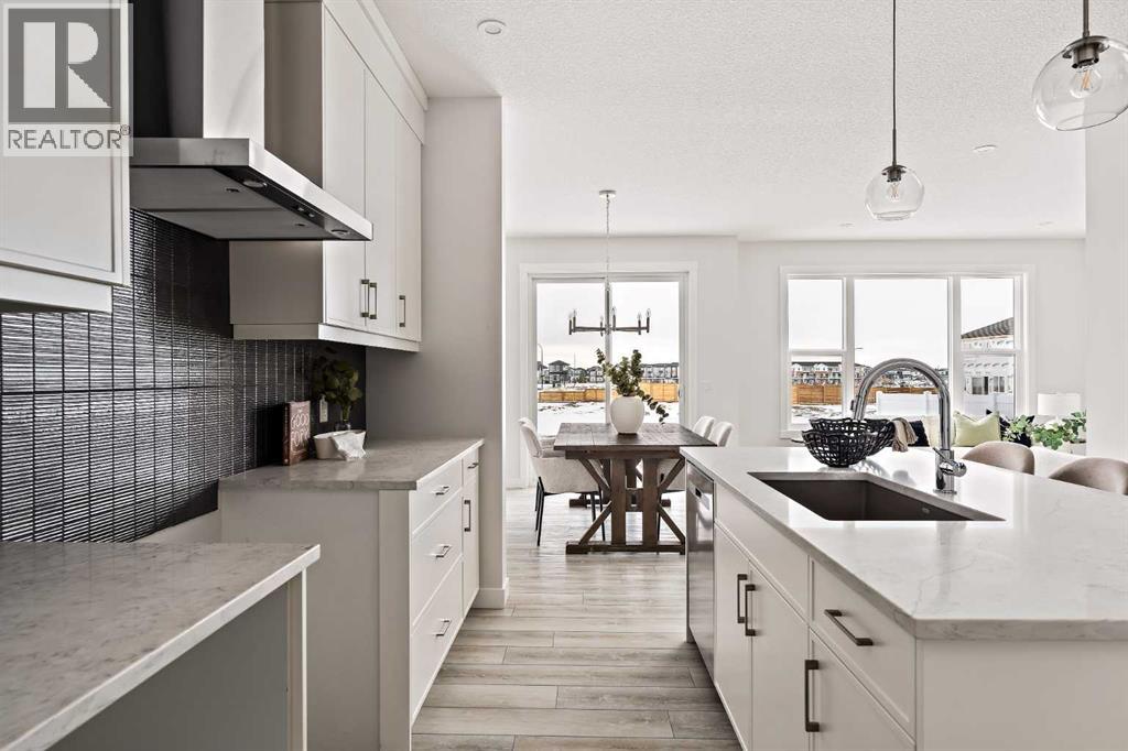 239 Creekstone Circle SW, Calgary, Alberta  T2X 5M5 - Photo 4 - A2276232