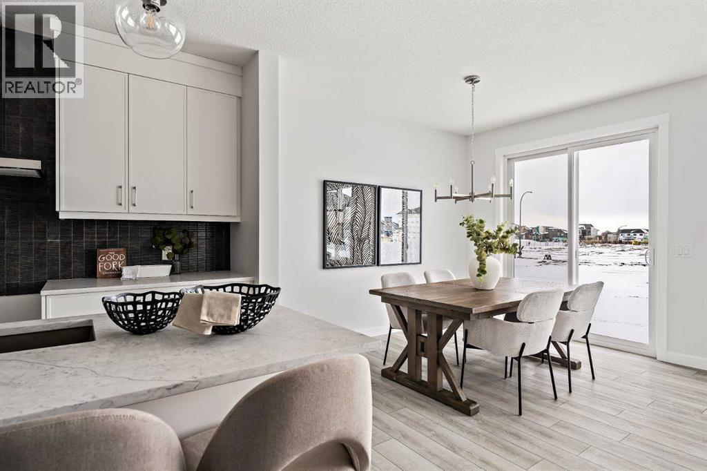 239 Creekstone Circle SW, Calgary, Alberta  T2X 5M5 - Photo 8 - A2276232