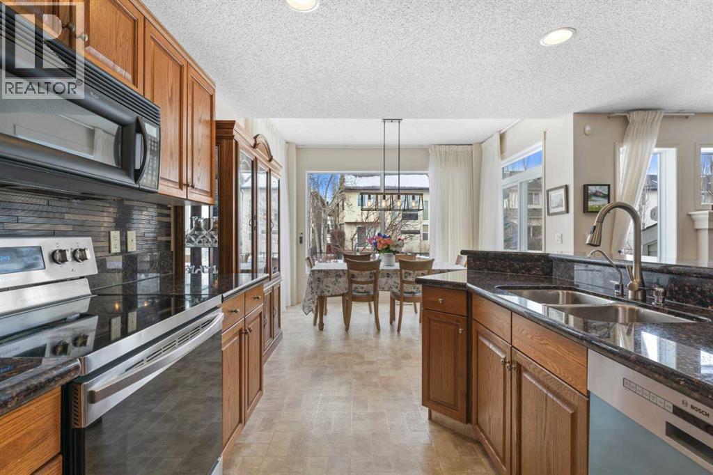 98 Cougarstone Close Sw, Calgary, Alberta  T3H 5W3 - Photo 7 - A2292774