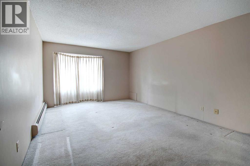 203, 3719b 49 Street NW, Calgary, Alberta  T3A 2E3 - Photo 11 - A2282504