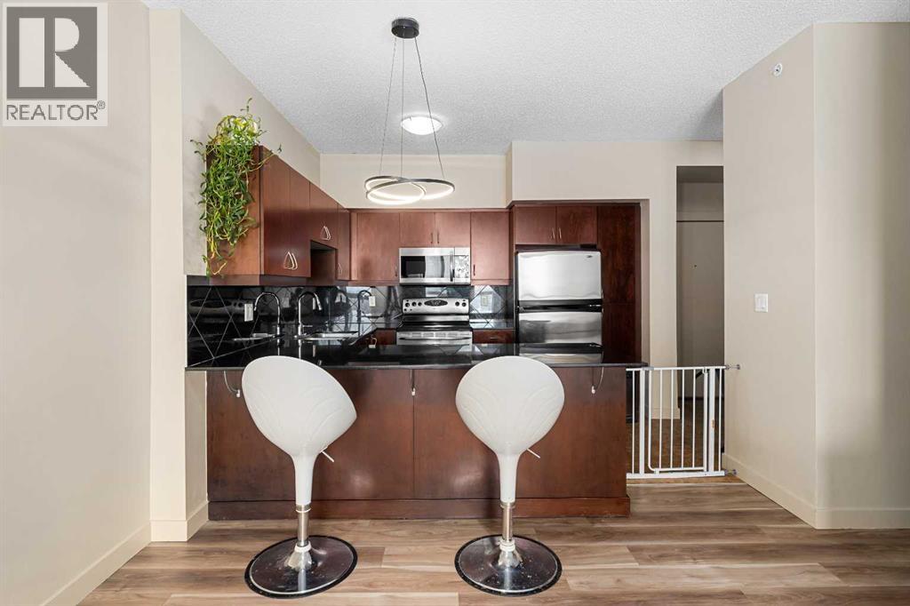 1302, 8710 Horton Road SW, Calgary, Alberta  T2V 0P7 - Photo 9 - A2297429