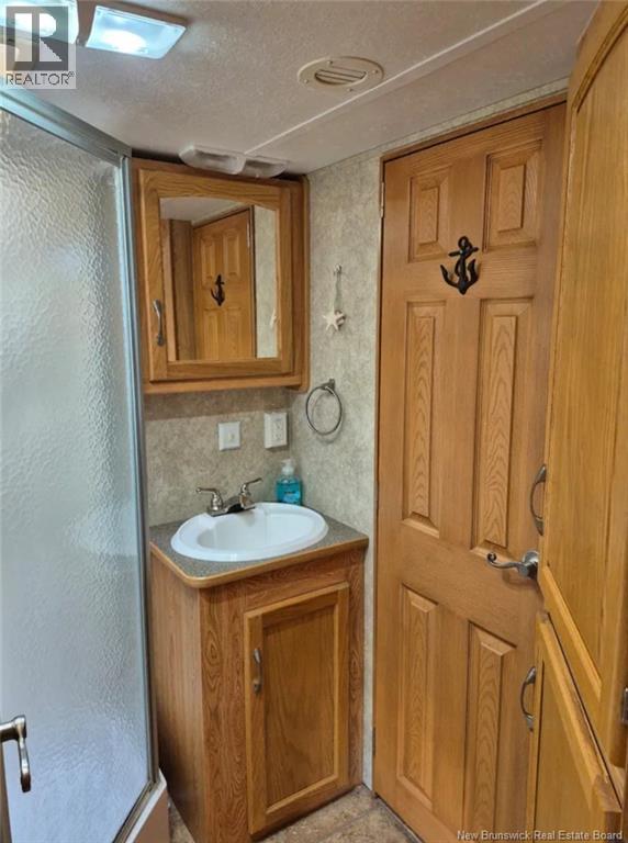 10 Florina Street, Cocagne, New Brunswick  E4R 2H7 - Photo 21 - NB136217