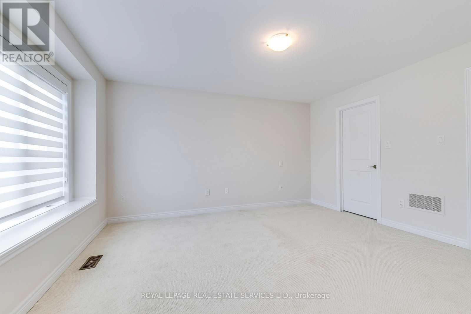 415 Wheat Boom Drive, Oakville, Ontario  L6H 0R3 - Photo 11 - W12943254