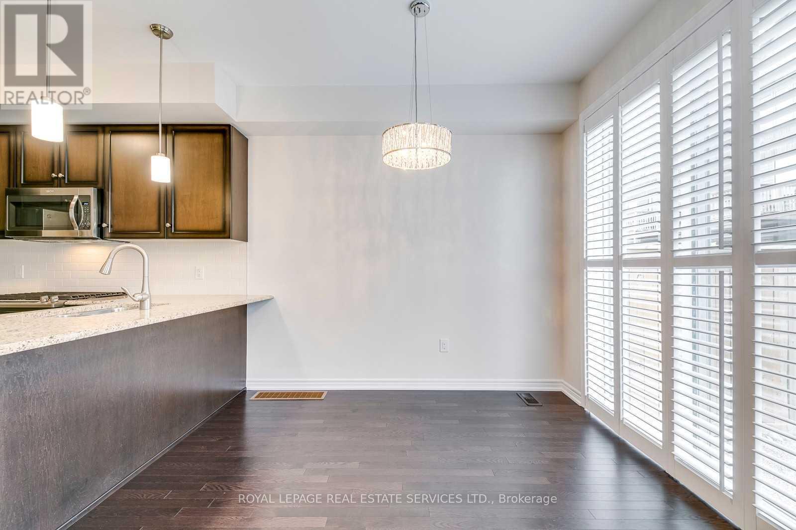 415 Wheat Boom Drive, Oakville, Ontario  L6H 0R3 - Photo 5 - W12943254