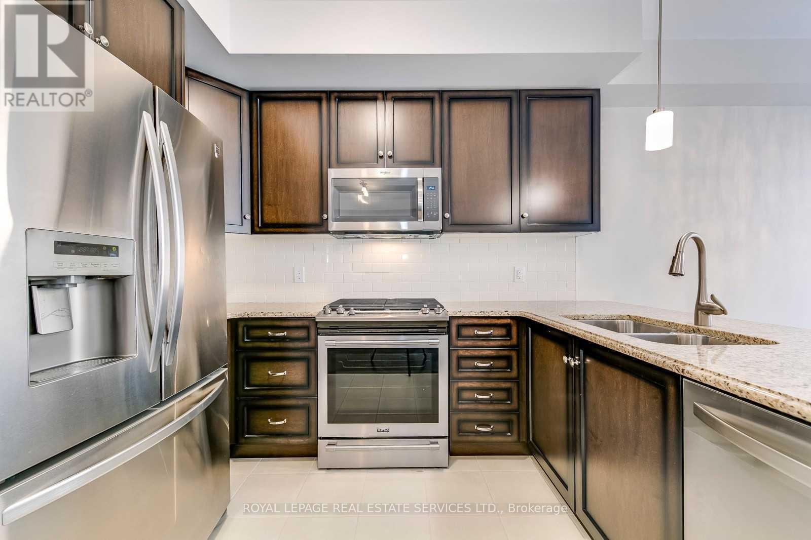 415 Wheat Boom Drive, Oakville, Ontario  L6H 0R3 - Photo 7 - W12943254