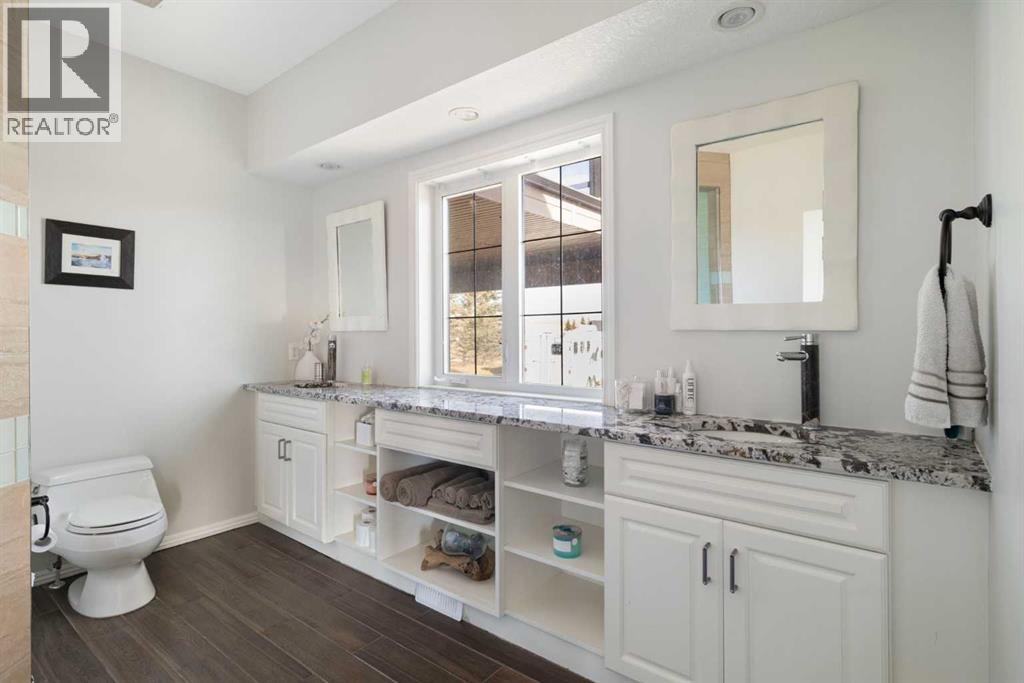 41031 Camden Lane, Rural Rocky View County, Alberta  T4C 1A1 - Photo 13 - A2265604