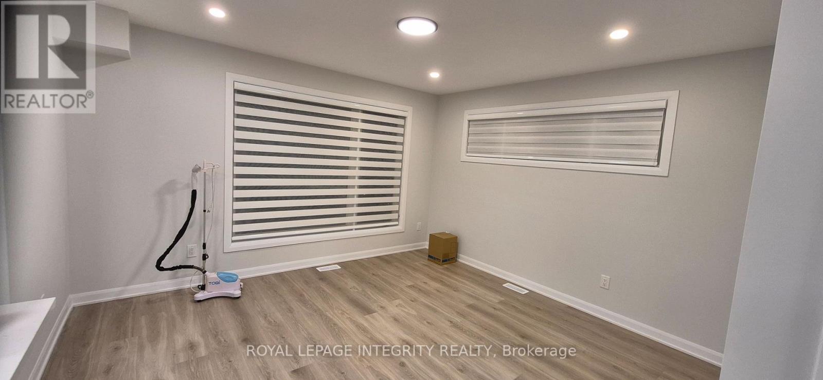 1 - 401 Glenroy Gilbert Drive, Ottawa, Ontario  K2J 7N7 - Photo 4 - X12943952