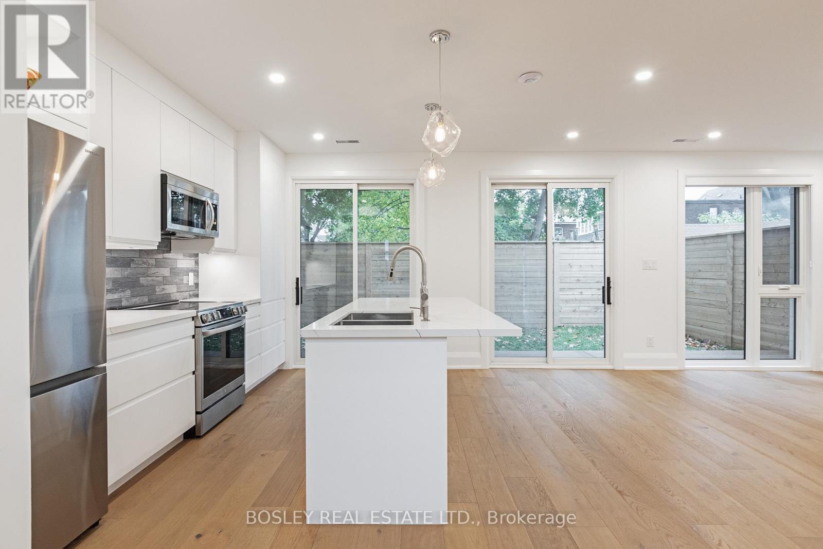 Rear - 108 Moberly Avenue, Toronto, Ontario  M4C 4B1 - Photo 10 - E12944014