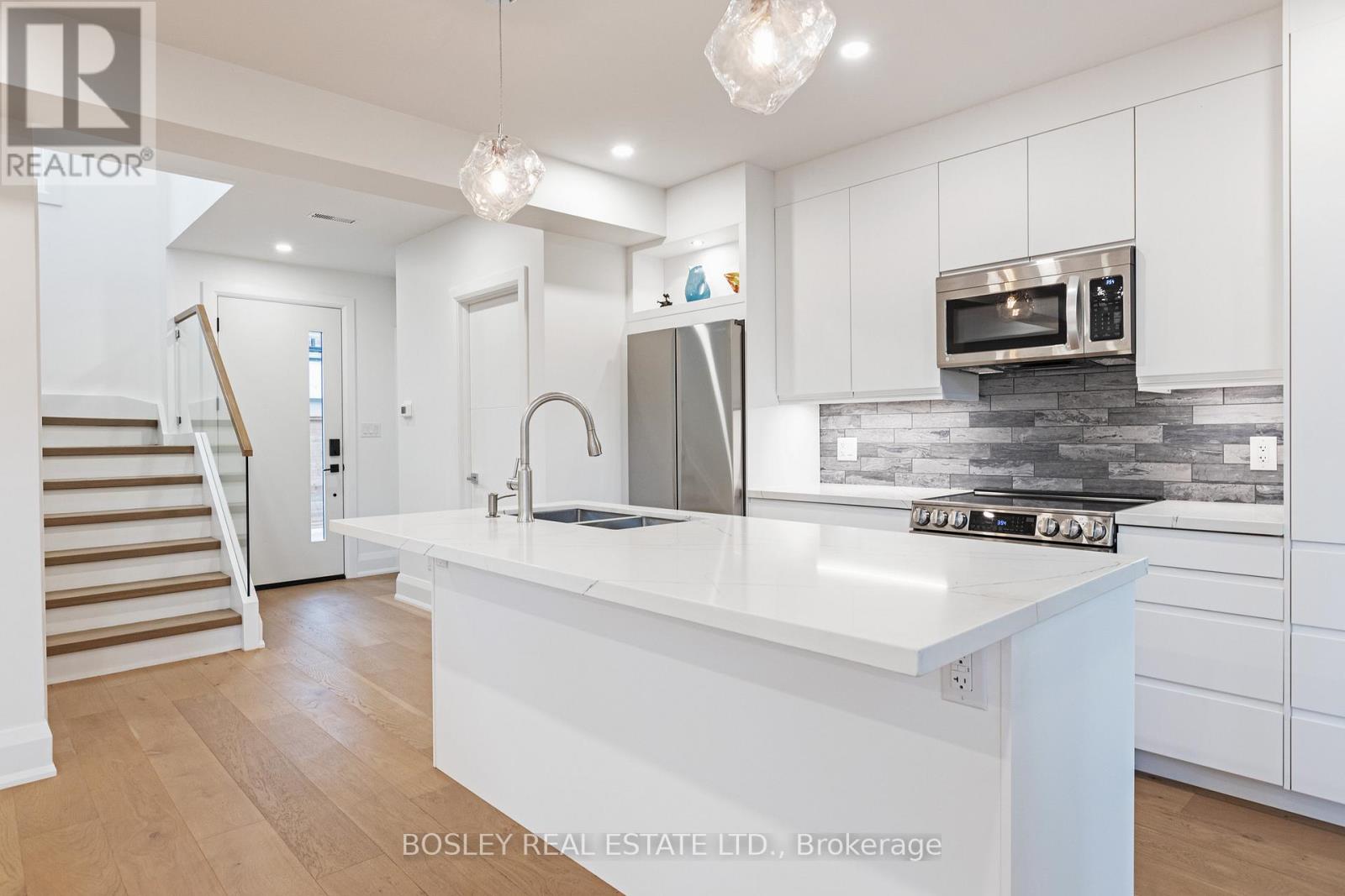 Rear - 108 Moberly Avenue, Toronto, Ontario  M4C 4B1 - Photo 4 - E12944014