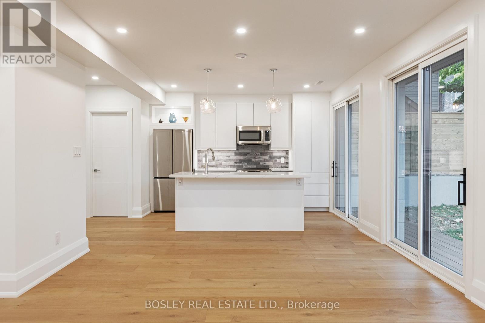 Rear - 108 Moberly Avenue, Toronto, Ontario  M4C 4B1 - Photo 5 - E12944014