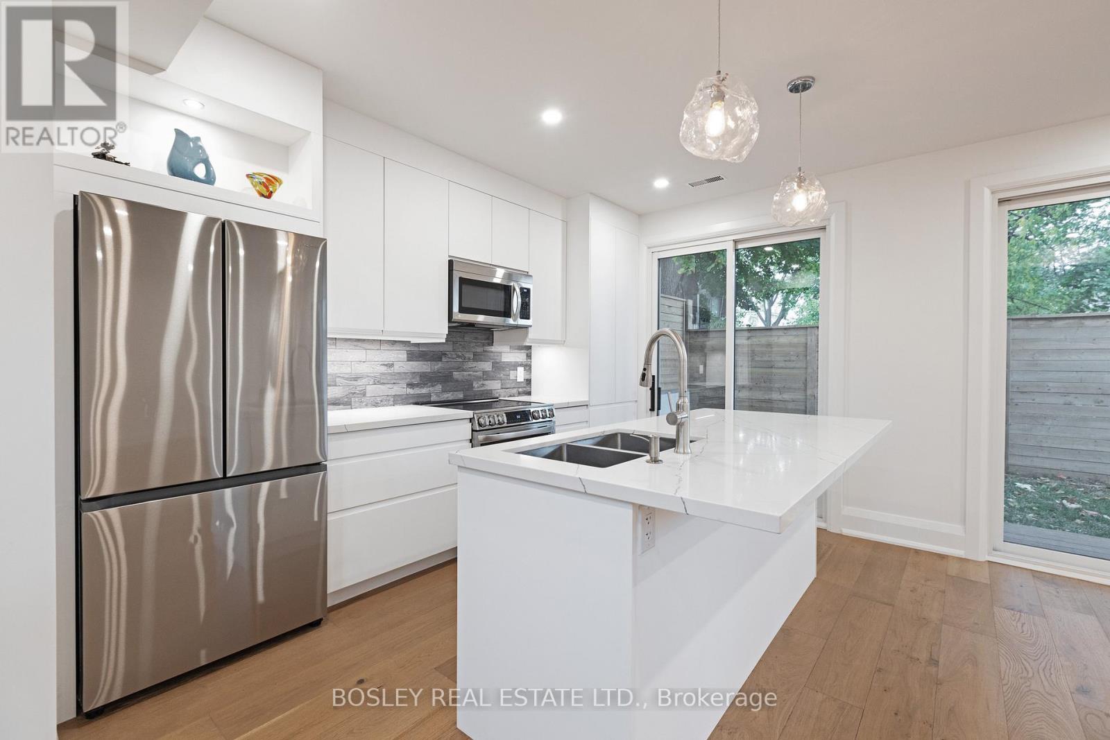 Rear - 108 Moberly Avenue, Toronto, Ontario  M4C 4B1 - Photo 6 - E12944014