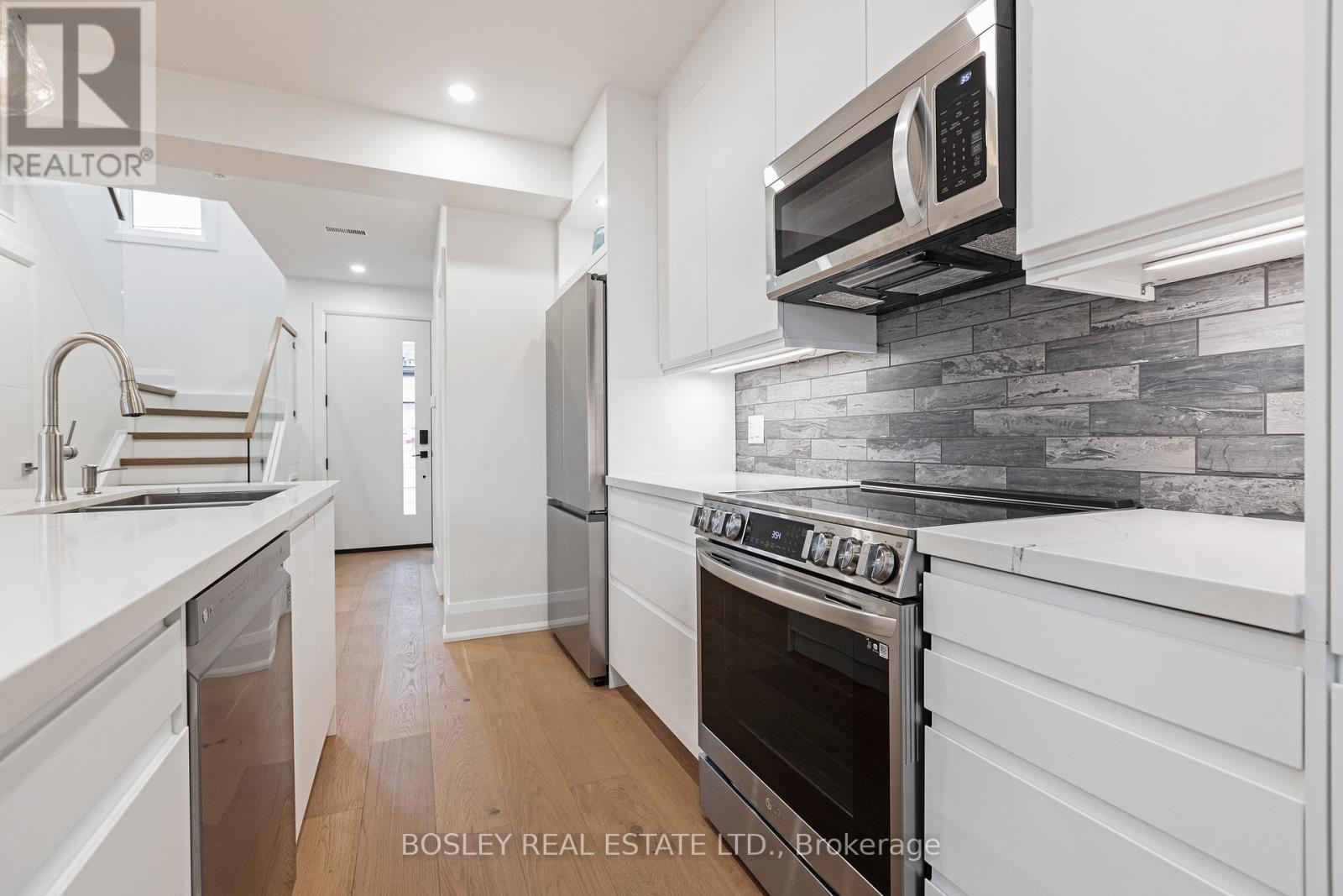 Rear - 108 Moberly Avenue, Toronto, Ontario  M4C 4B1 - Photo 7 - E12944014