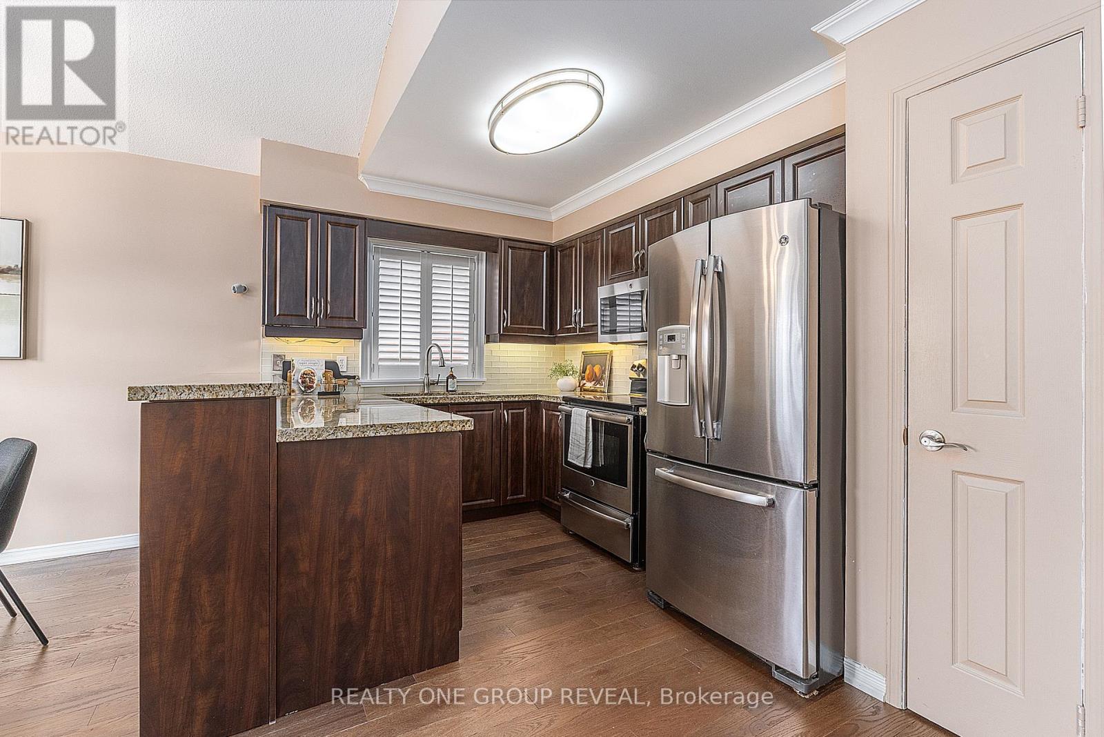 37 Wetherburn Drive, Whitby, Ontario  L1P 1M7 - Photo 11 - E12944108